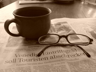 http://ittybiz.com/wp-content/uploads/2007/10/coffee-newspaper-1.jpg