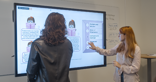 Students using NUITEQ Chorus