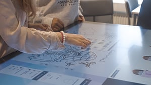 hands on the whiteboard