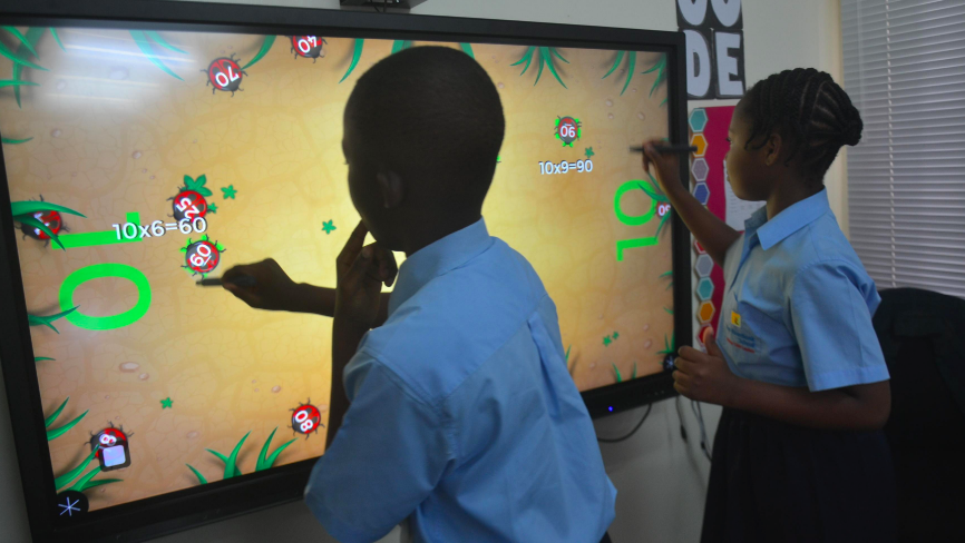Children using MultiTeach Bugs with WOWbii touchscreen