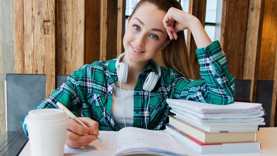 Girl with books studying