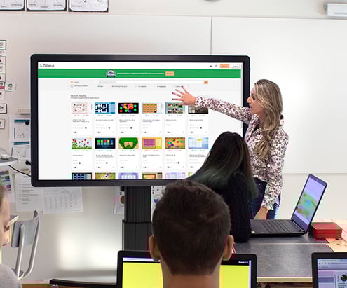 Teacher_showing_SF_in_front_of_class