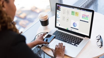 Woman working in Stage on laptop