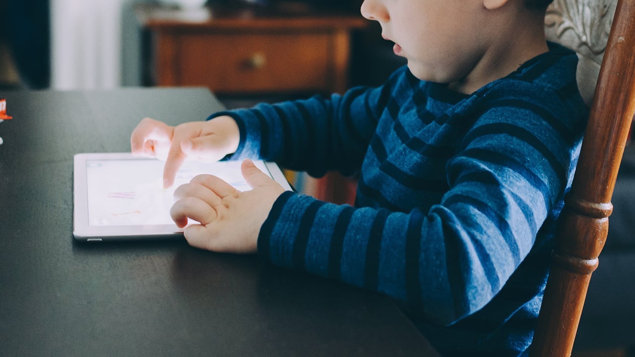 child with tablet