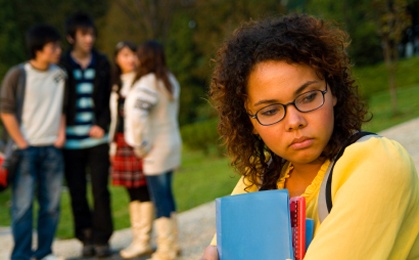 girl-stands-apart-from-others.jpg