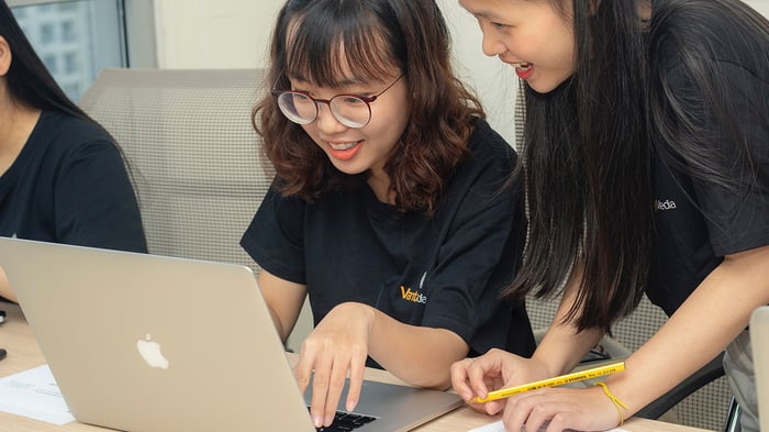 girls in front of computer