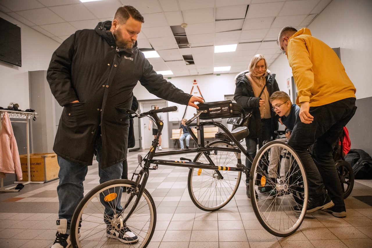 kid receiving mobility bike