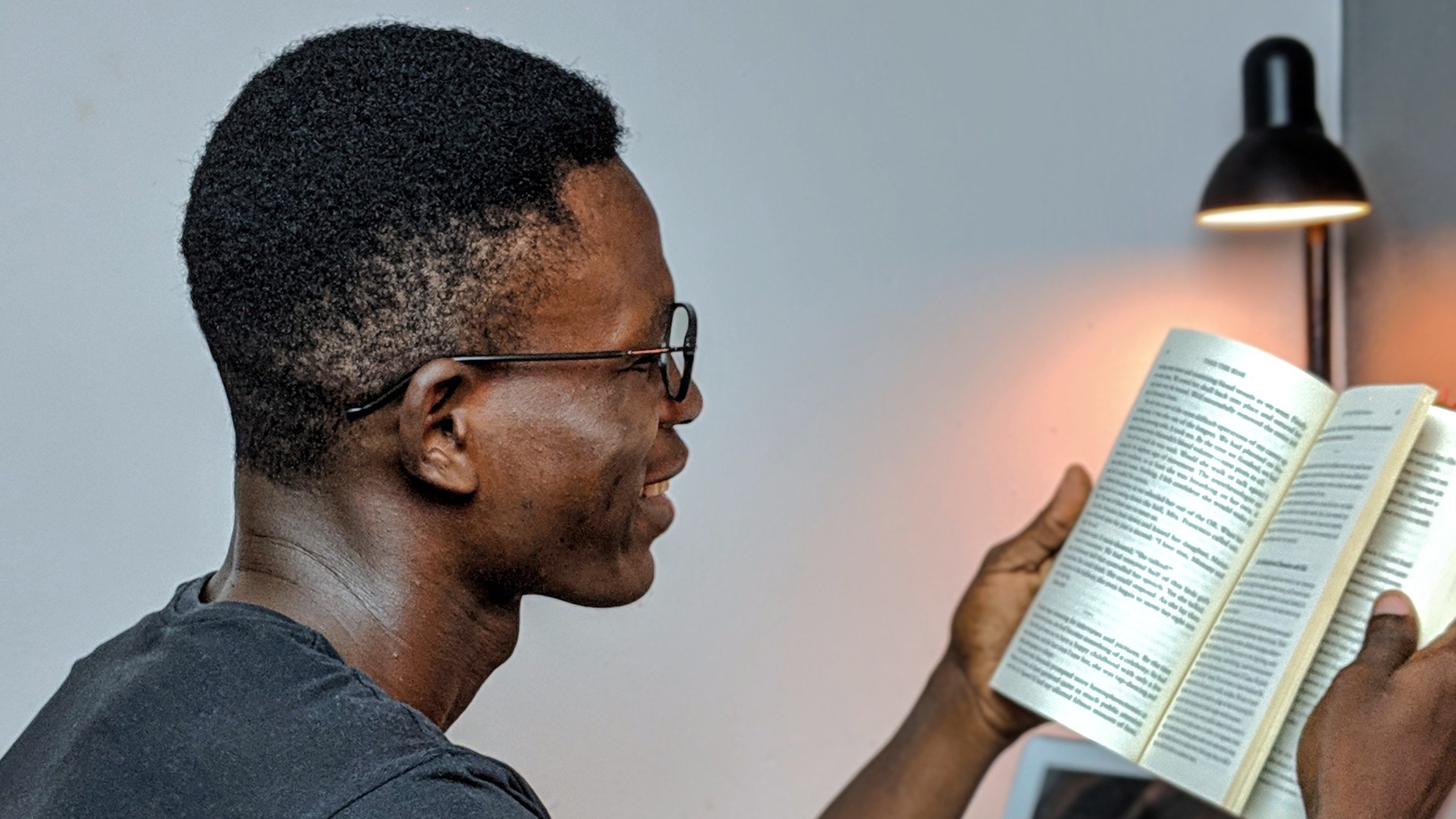 man holding book