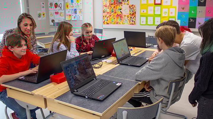 teacher_and_kids_using_snowflake_individually